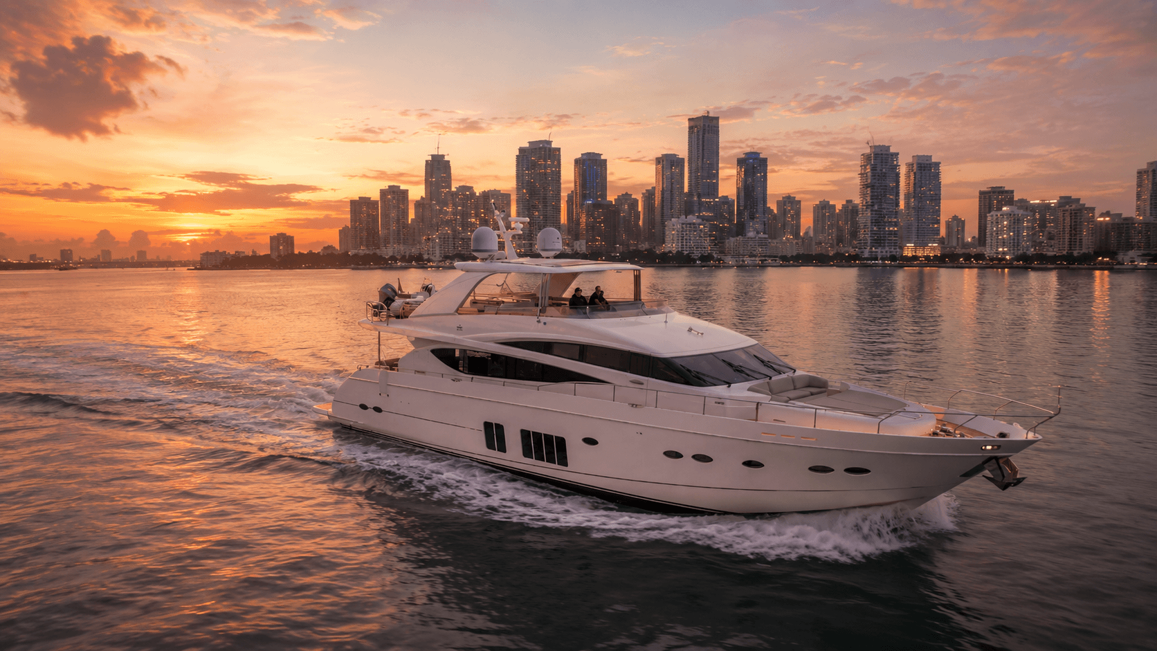 88 Princess PFO White luxury yacht sailing near a sunset city skyline over calm water.