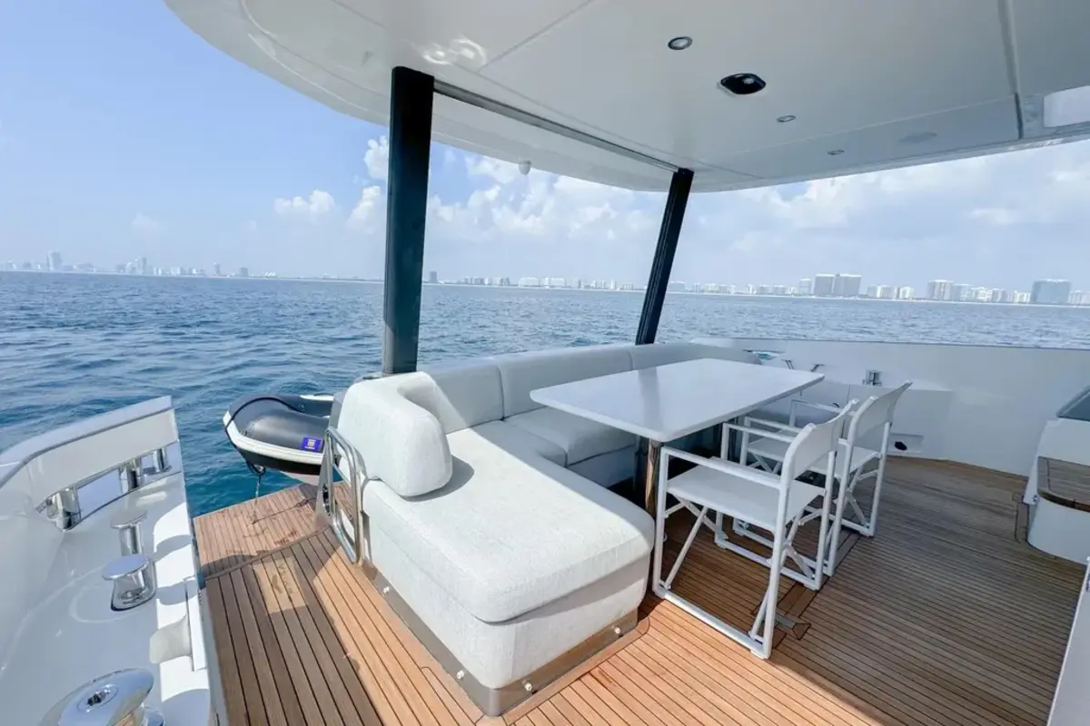 Guests aboard 70 ft Azimut 2023 yacht near Haulover sandbar Miami