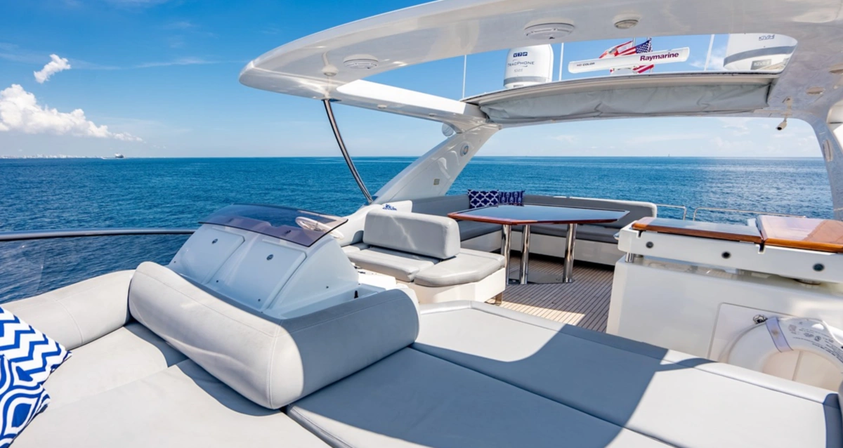 Outdoor dining setup on deck of 70 ft Azimut Days yacht Miami