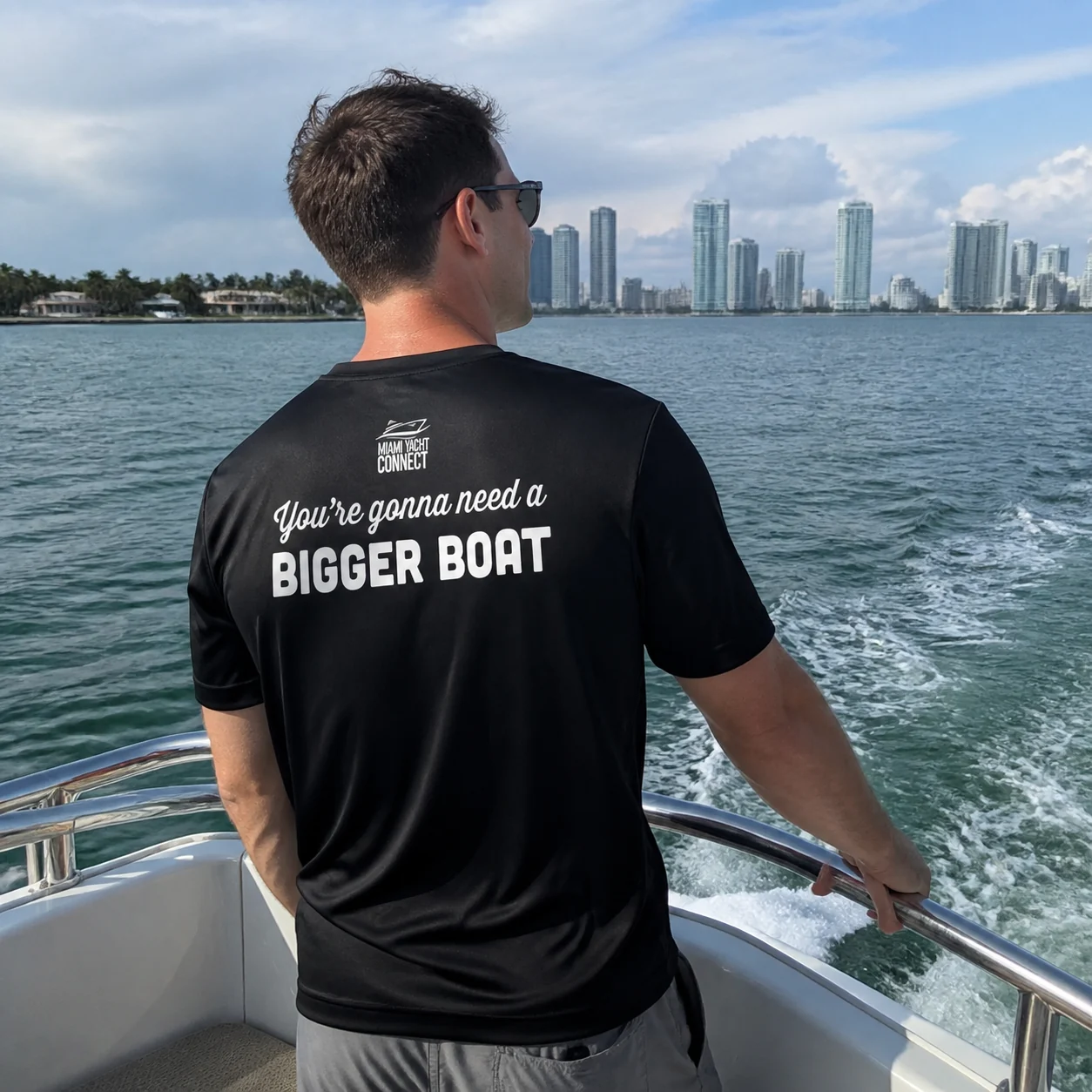 The black You're Gonna Need A Bigger Boat t-shirt worn on a yacht in Miami