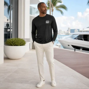 The black Make Yachting Great Again long-sleeve shirt worn on a yacht in Miami