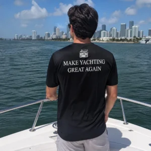 The black Make Yachting Great Again t-shirt worn on a yacht in Miami