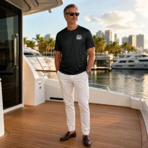 The black What's Your Budget t-shirt worn on a yacht in Miami