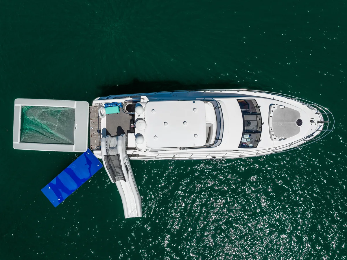 Guests aboard 60 ft Azimut S yacht near Haulover sandbar Miami