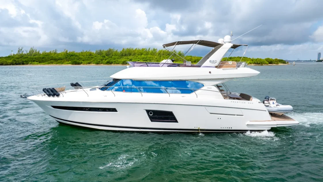 Guests aboard 65 ft Prestige yacht near Haulover sandbar Miami