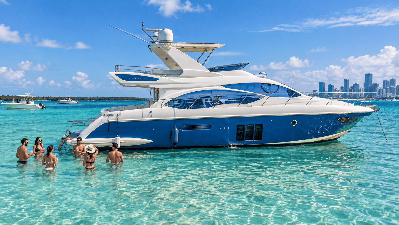 Flybridge motor yacht cruising past the Miami skyline on Biscayne Bay on a bright afternoon